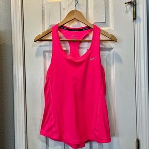 Nike Hot Pink Running tank. Dri-fit material  Womens small.  Great condition